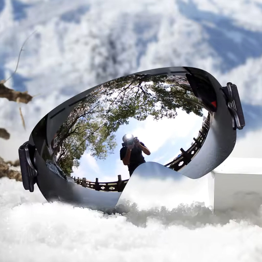 Gafas de esquí y snowboard UV400 antivaho con lente espejada sobre la nieve