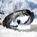Gafas de esquí y snowboard UV400 antivaho con lente espejada sobre la nieve